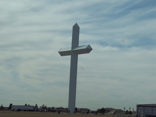 Jesus Christ that's a huge cross.  Somewhere in Hell, Texas.