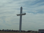 Jesus Christ that's a huge cross.  Somewhere in Hell, Texas.
