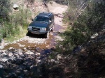 Me, driving through shallow water.