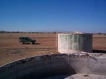 A view from the pool out towards the road.  Note the Xterra.