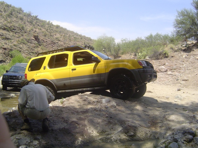 Climbing a rock formation.