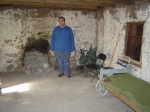 Inside the original one room.  Smelled sick.