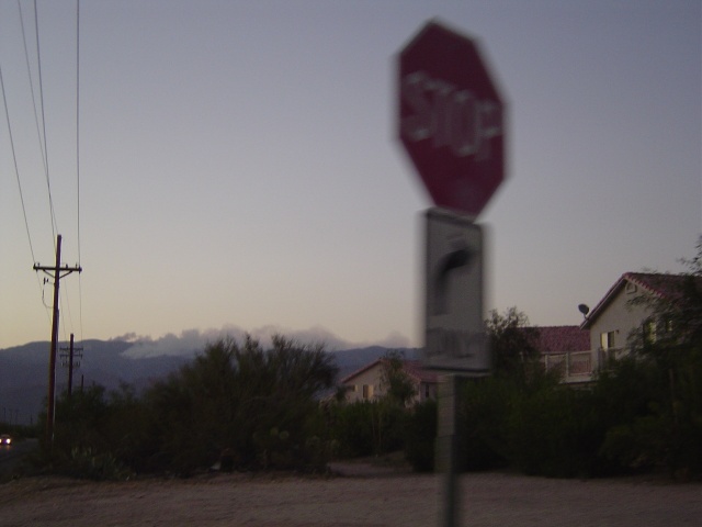 A blurry stop sign leaving Jack's house.