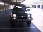 The installed bumper with new fog lights.