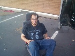 Gus sitting on my driver's seat.  I had to remove it to run wires for the CB.